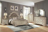 Realyn Upholstered Panel Bed, Dresser, Mirror, Chest and 2 Nightstands
