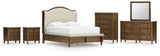 Sturlayne Upholstered Panel Bed, Dresser, Mirror, Chest and 2 Nightstands