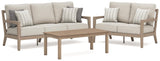 Hallow Creek Outdoor Sofa and Loveseat with Coffee Table