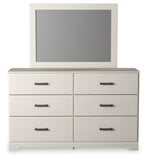 Stelsie Panel Bed with Mirrored Dresser and Chest