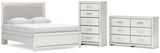 Zuraleus Upholstered Panel Bed, Dresser and Chest