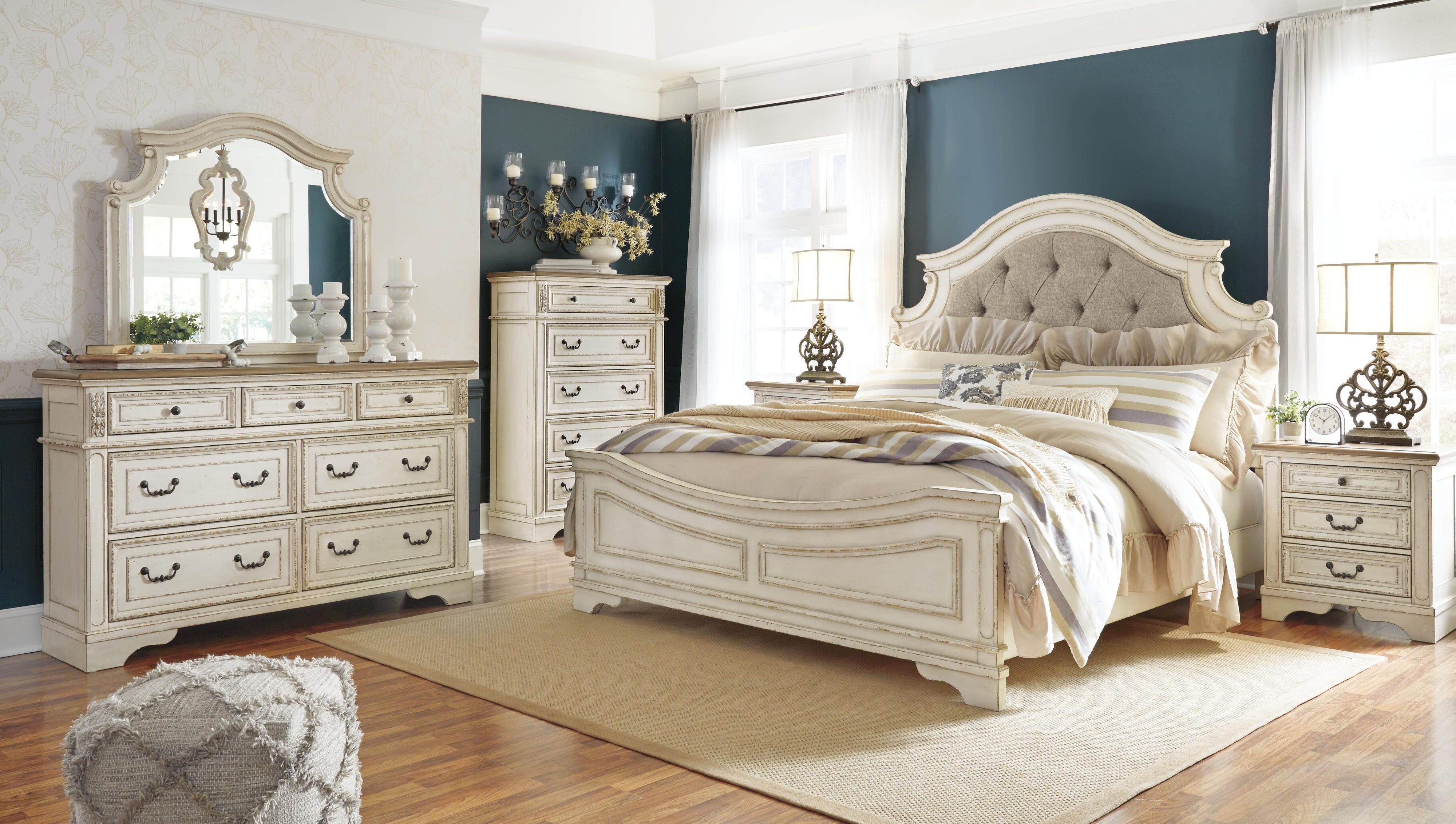 Realyn Upholstered Panel Bed with Mirrored Dresser, Chest and Nightstand