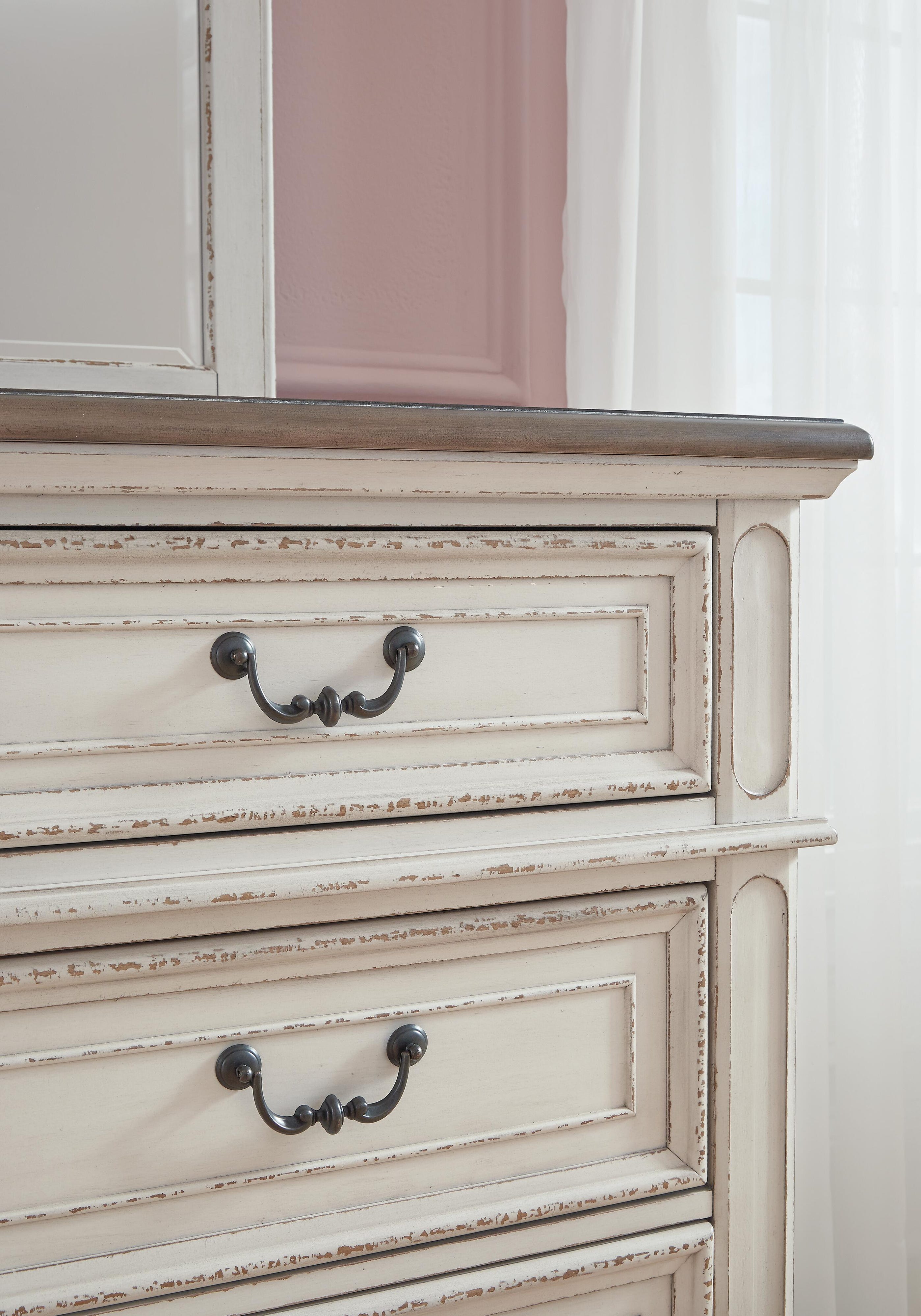 Realyn Upholstery Panel Bed, Dresser, Chest, Nightstand, and Vanity Set