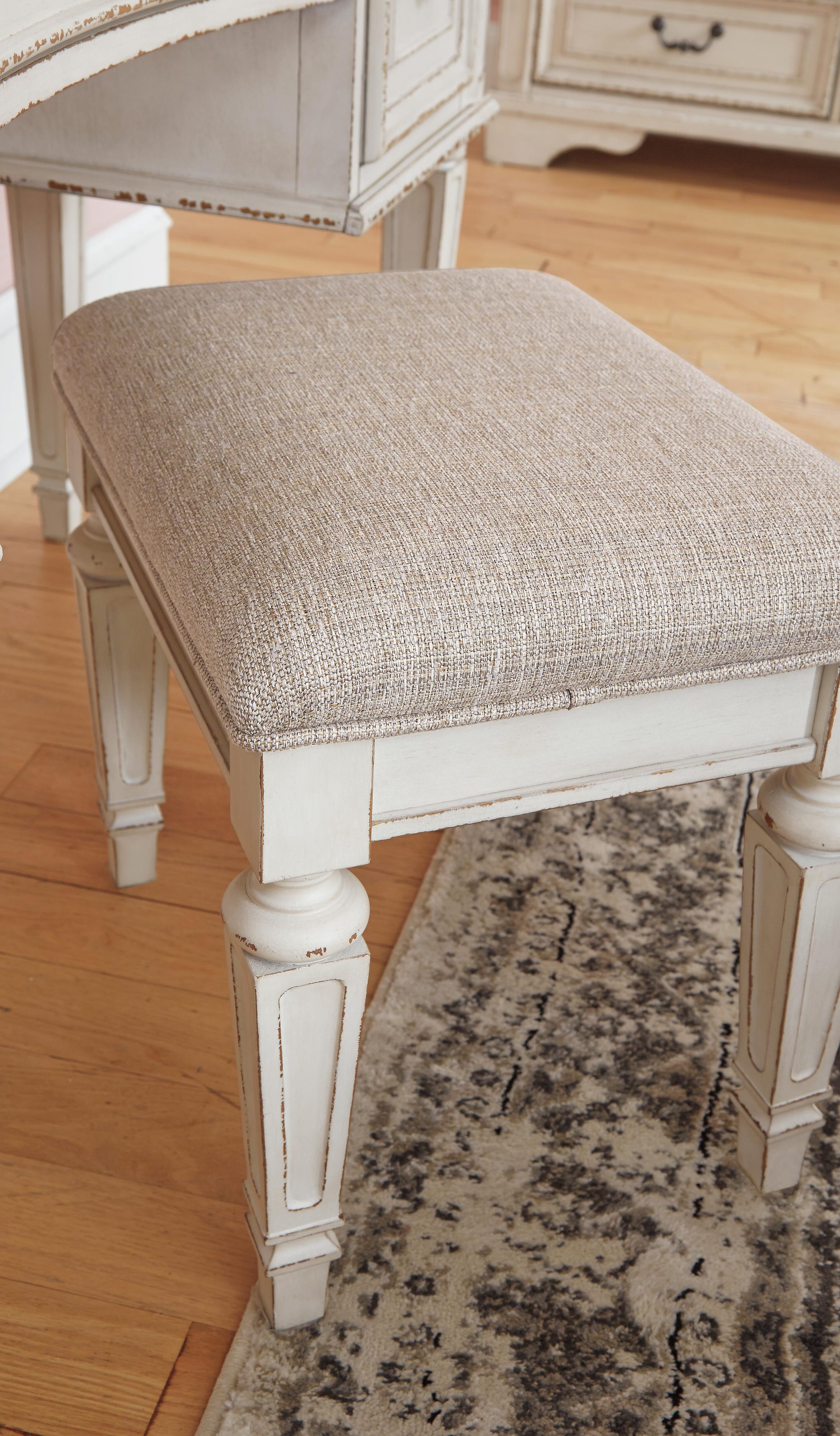 Realyn Upholstery Panel Bed, Dresser, Chest, Nightstand, and Vanity Set
