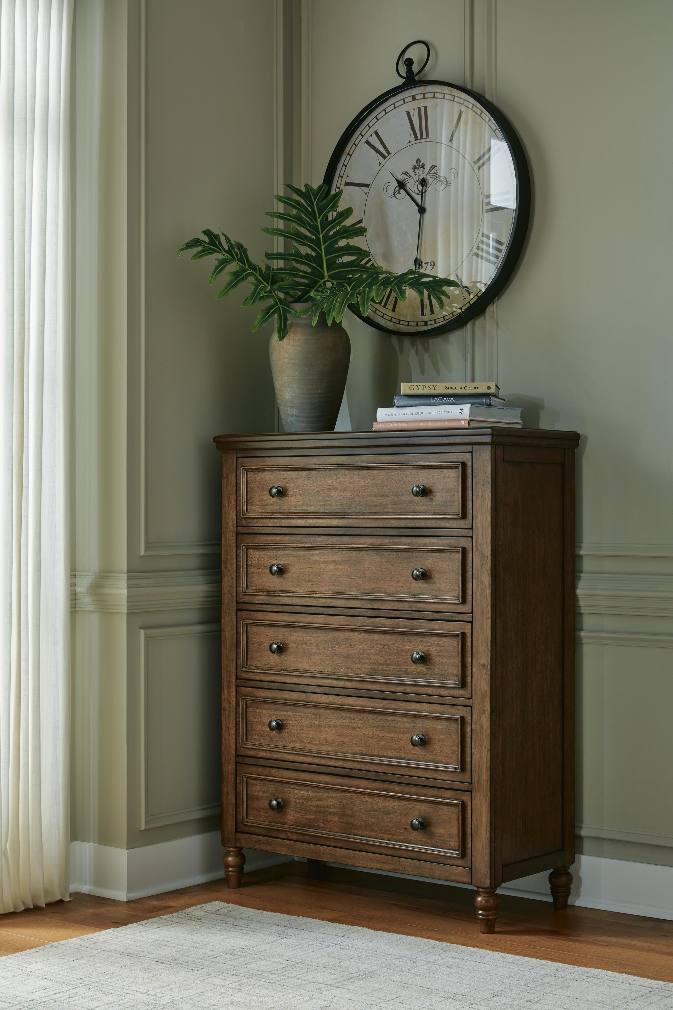 Sturlayne Upholstered Panel Bed, Dresser, Mirror and Chest
