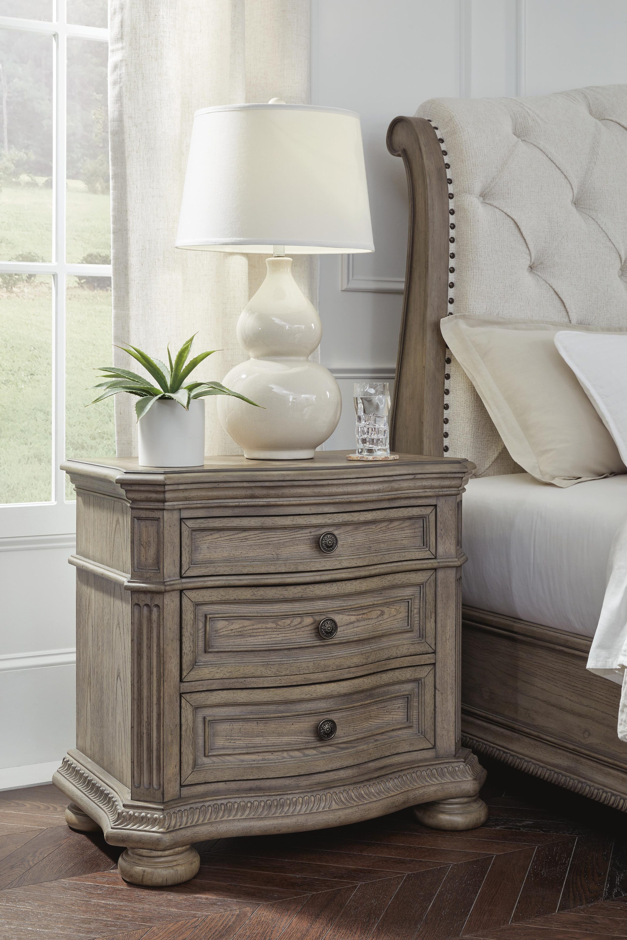 Ardenfield Upholstered Sleigh Bed and 2 Nightstands
