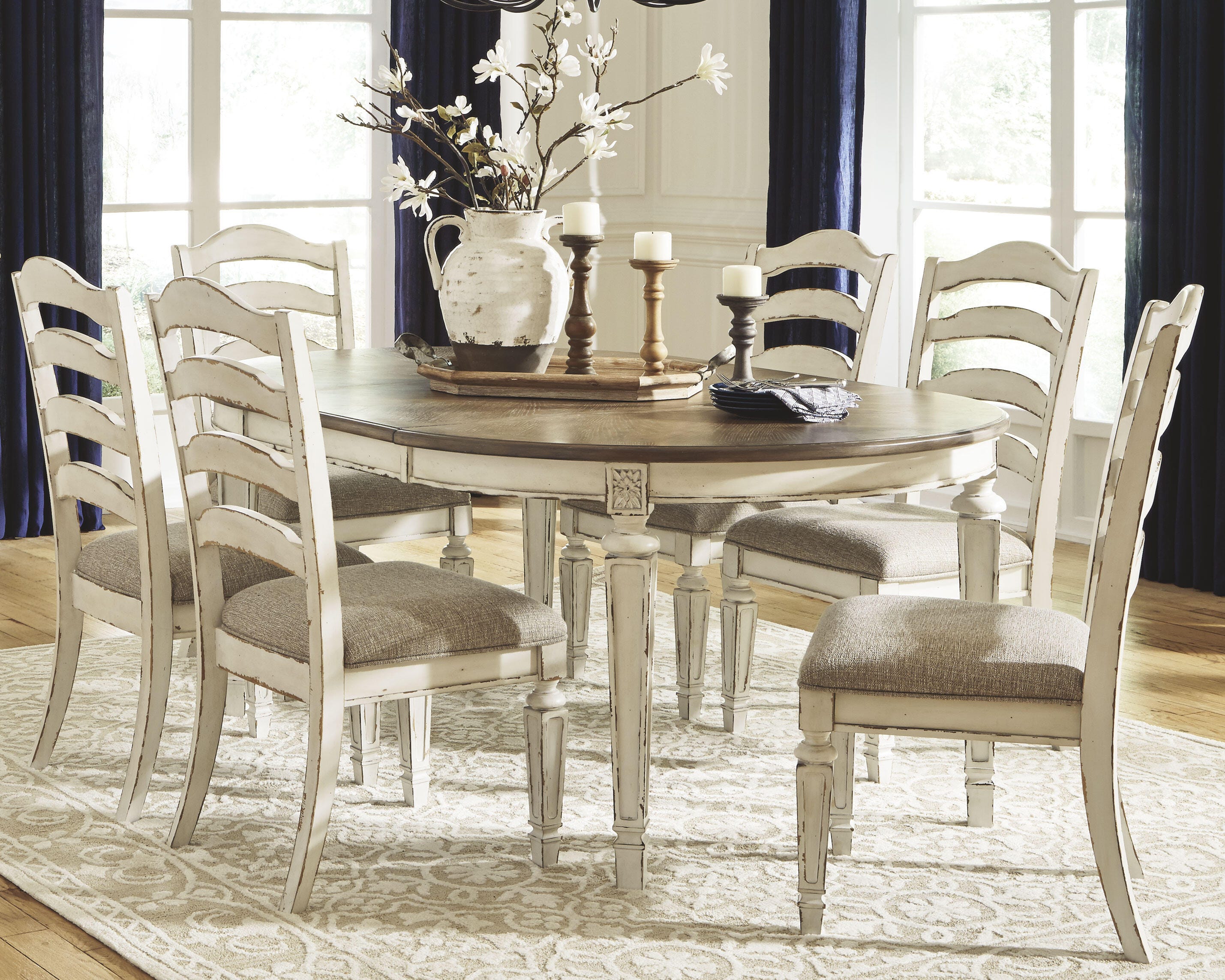 Realyn Oval Extendable Dining Table and 6 Chairs