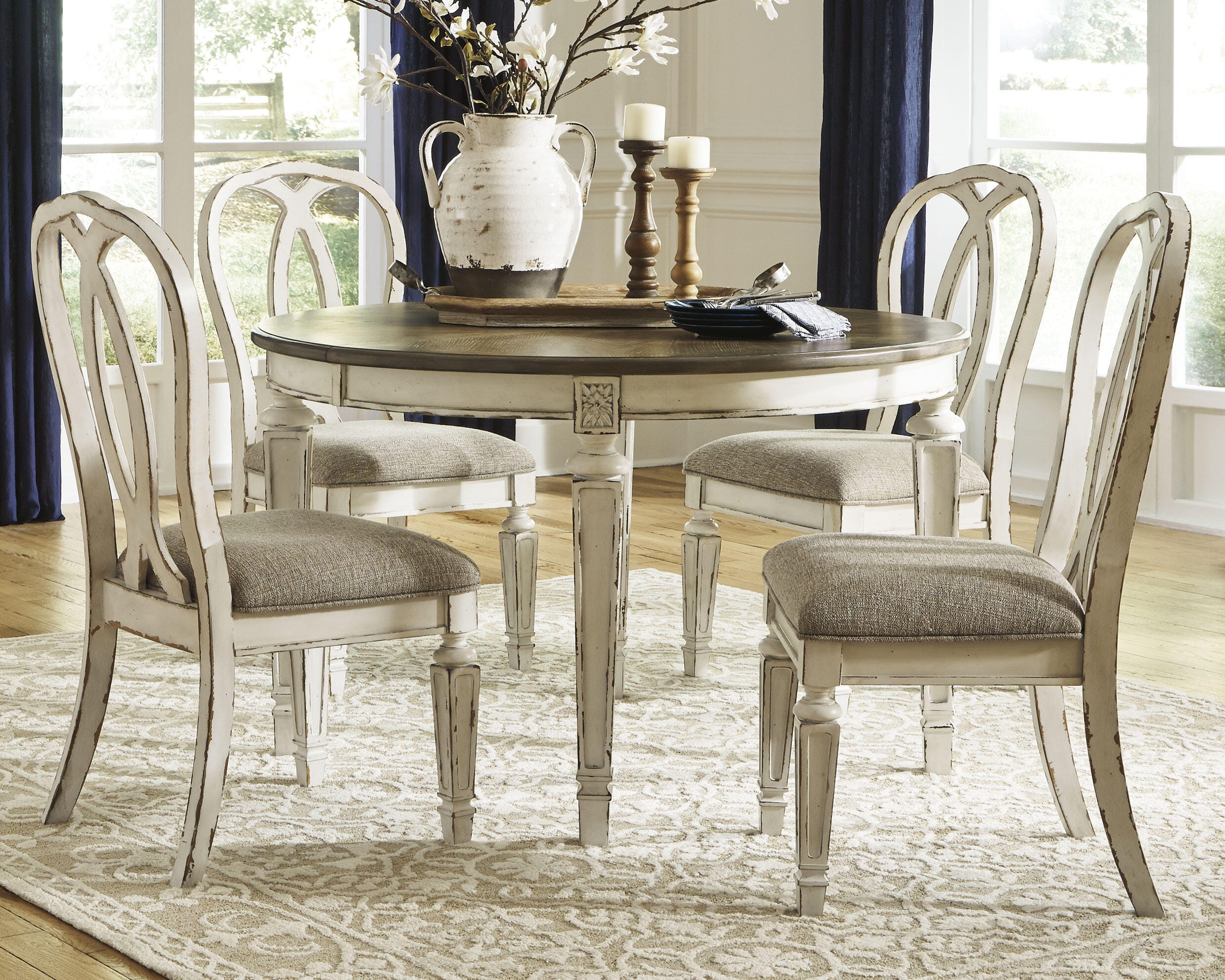 Realyn Extendable Dining Table and 4 Ribbon Back Chairs