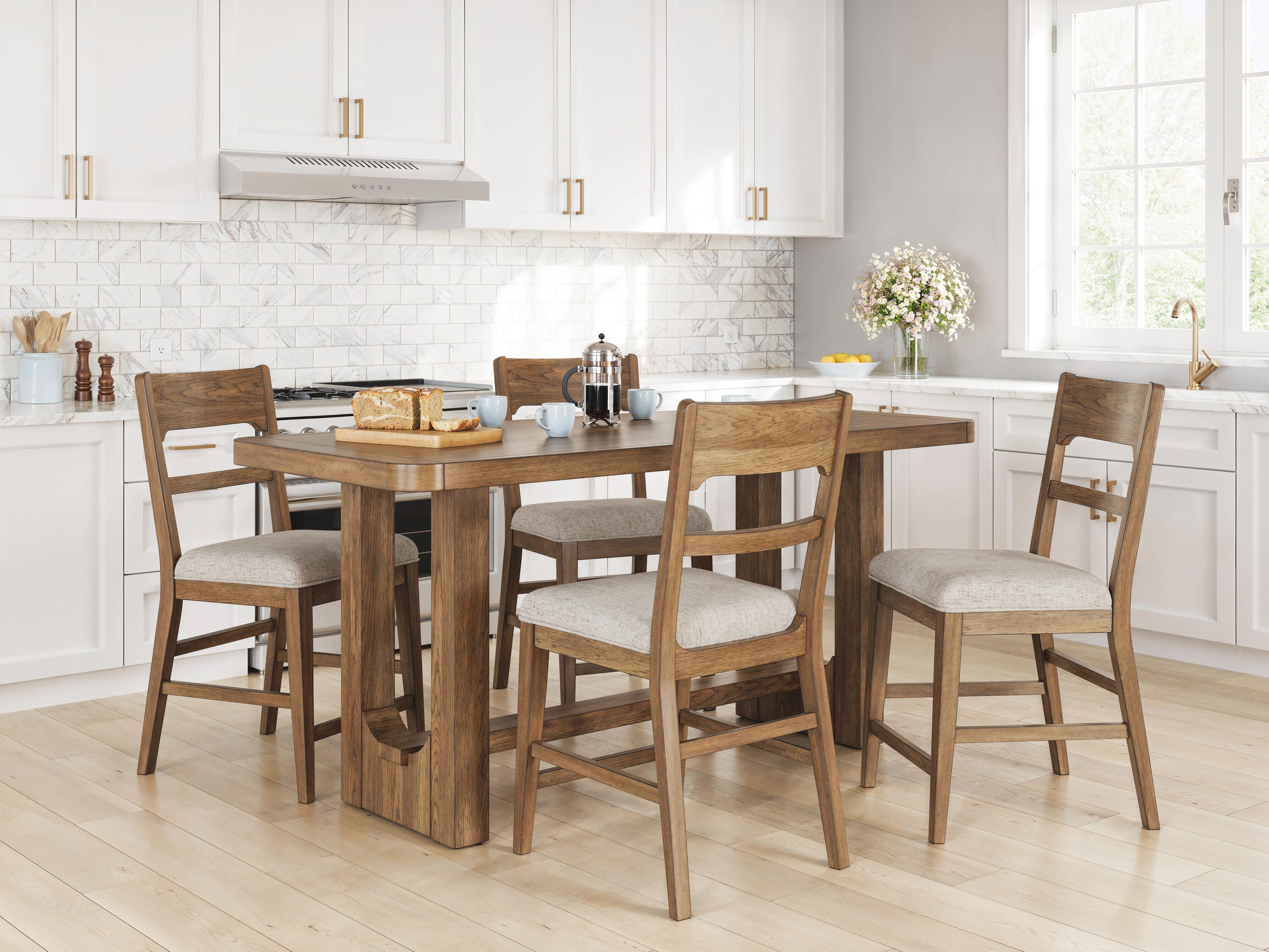 Cabalynn Counter Height Dining Table and 4 Barstools