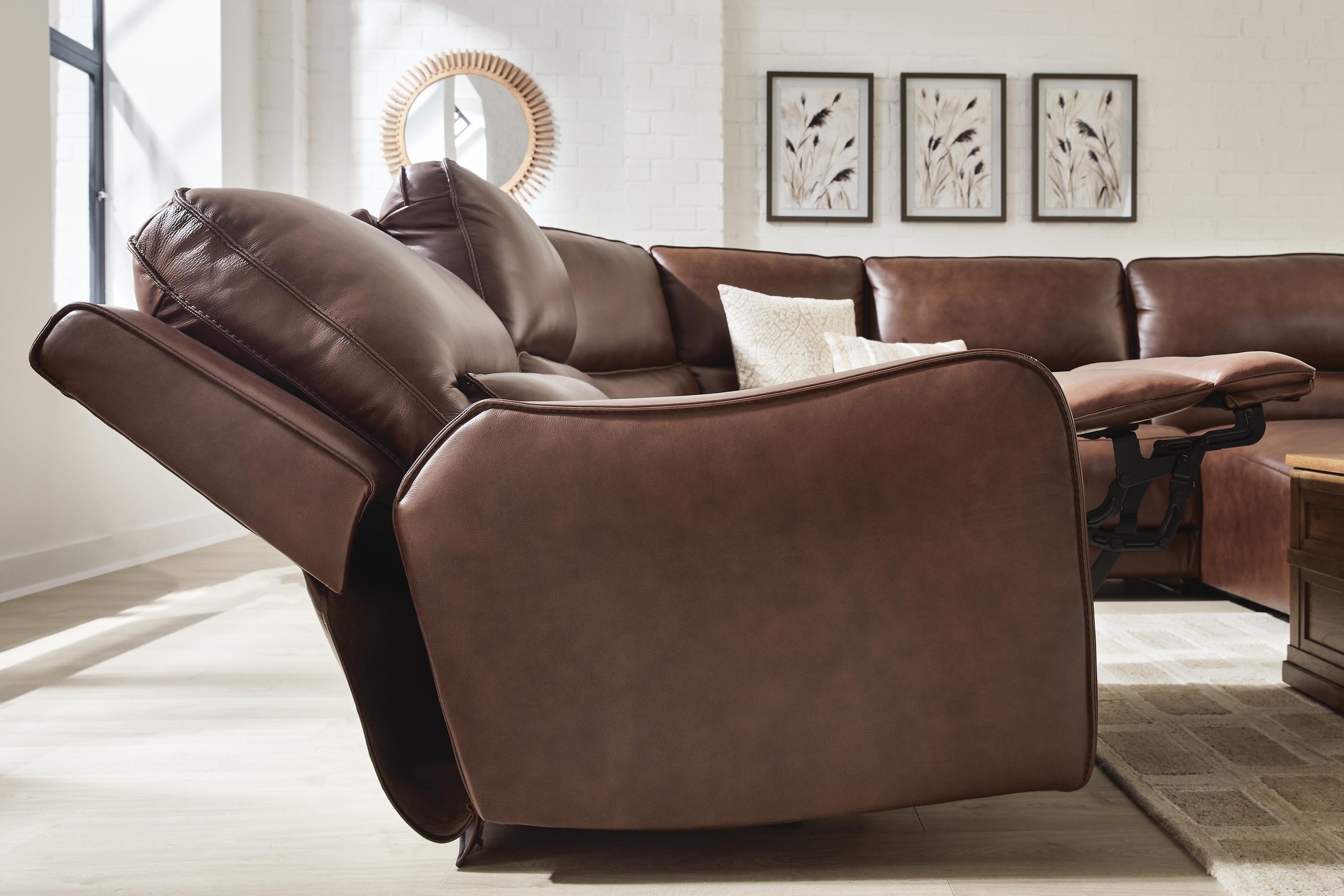 DeepWakes 7-Piece Reclining Sectional with Chaise and Storage Consoles